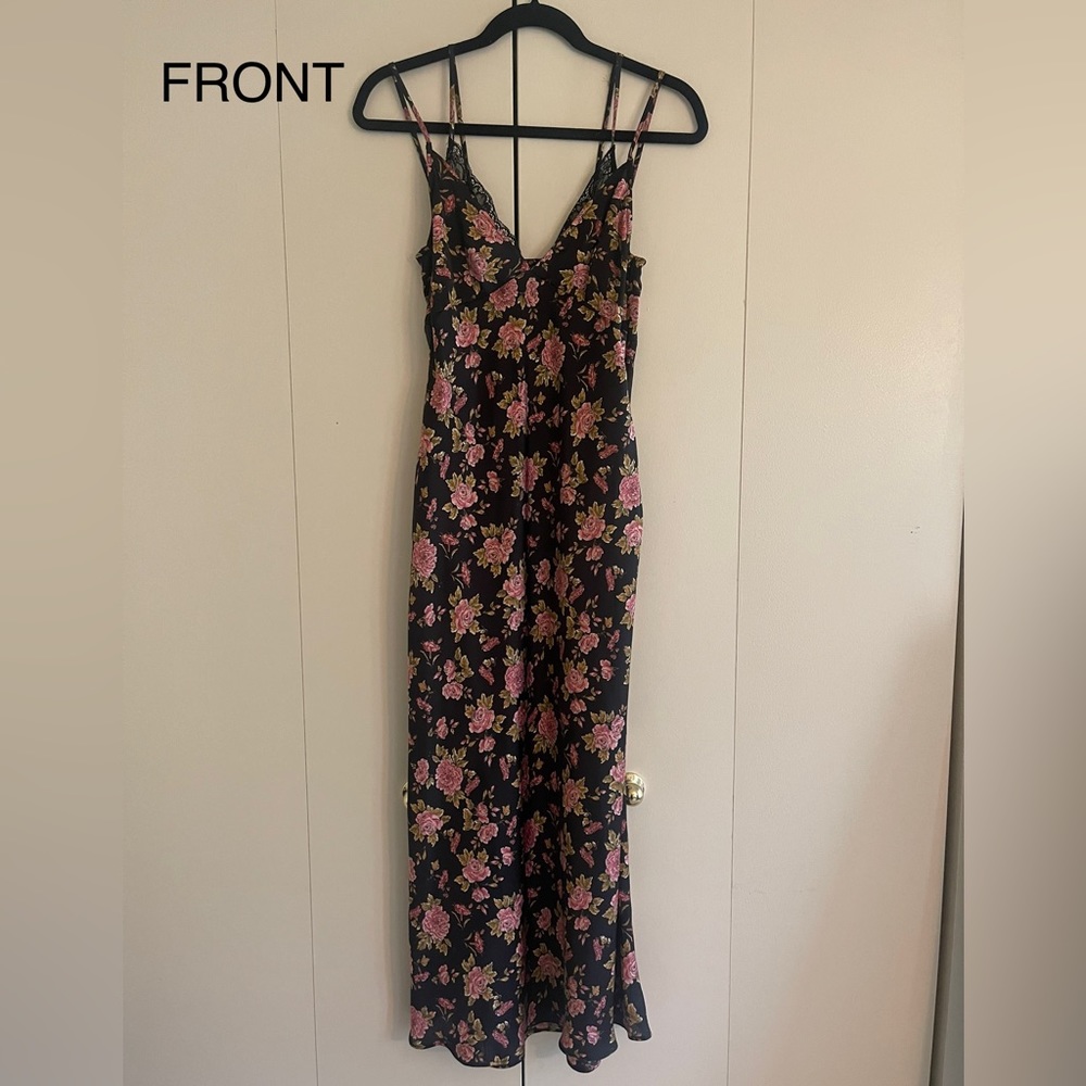 Zara dress Size S Color is a black foreground with pink roses pattern